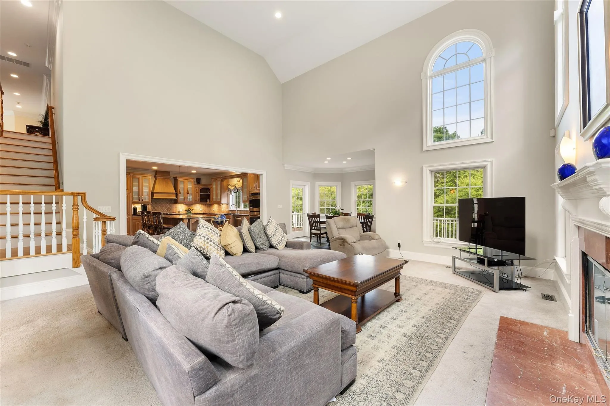View of the Family Room, Dining Area, Kitchen and back stairwell. View of the Family Room, Dining Area, Kitchen and back stairwell.