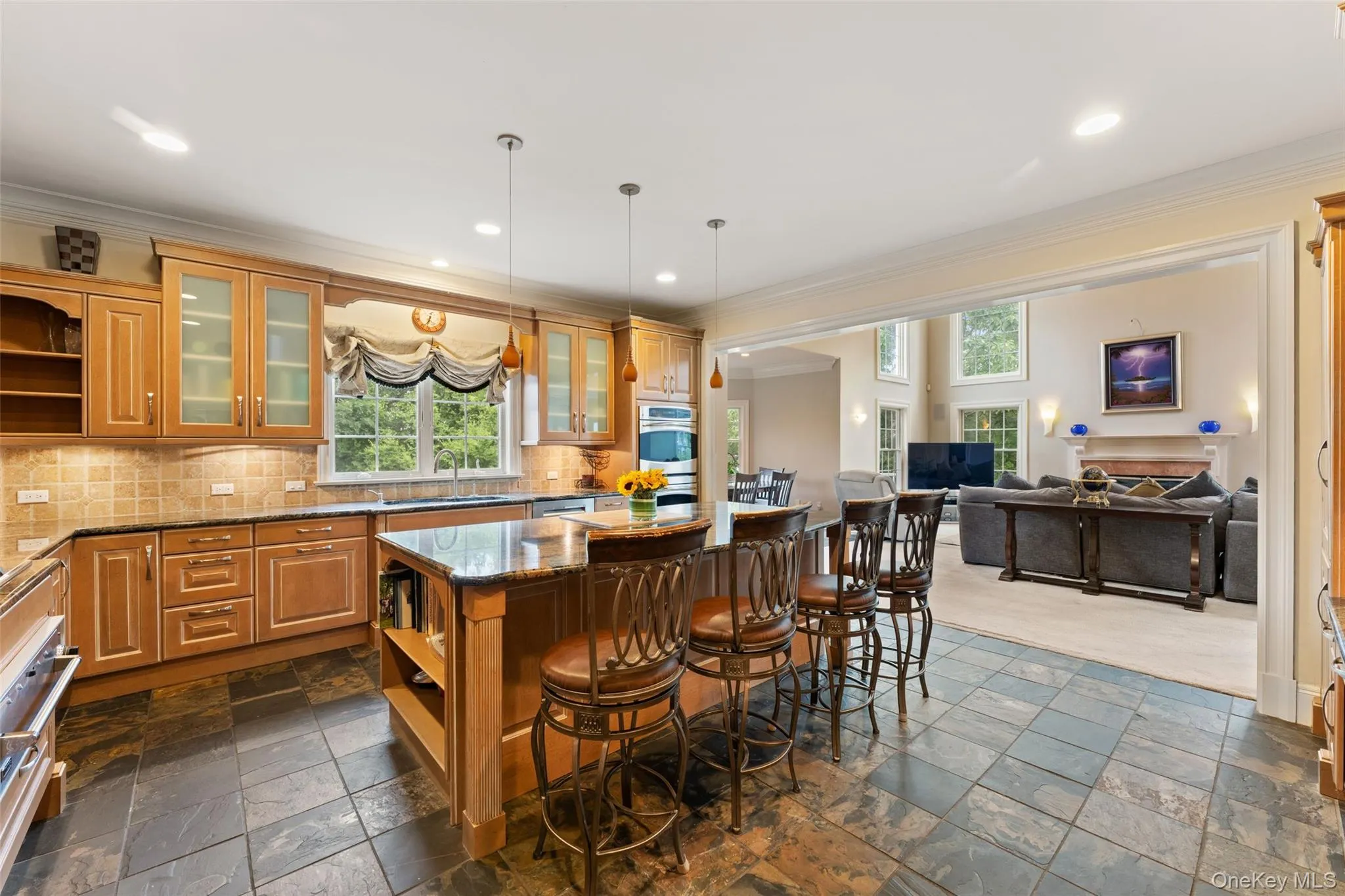Bilotta Chef's Kitchen featuring custom cabinetry and Wolfe Appliances. Bilotta Chef's Kitchen featuring custom cabinetry and Wolfe Appliances.