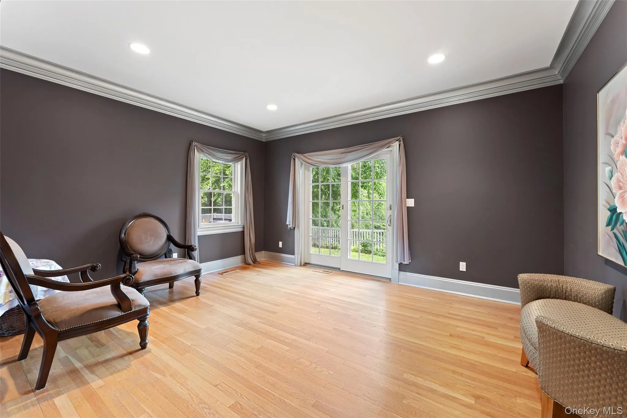 Music Room with French doors opening to the pool area. Music Room with French doors opening to the pool area.