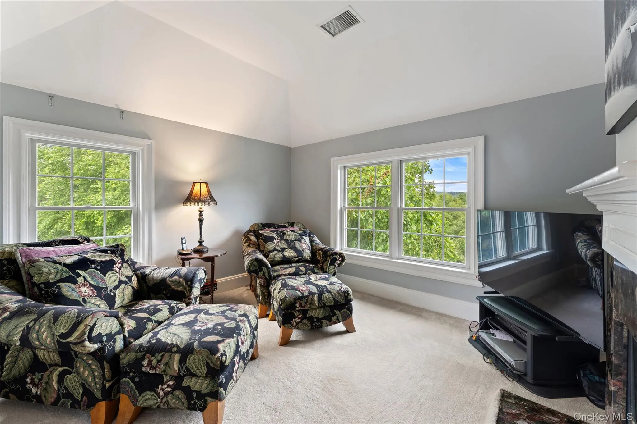 Primary Suite Sitting Room with Fireplace. Primary Suite Sitting Room with Fireplace.