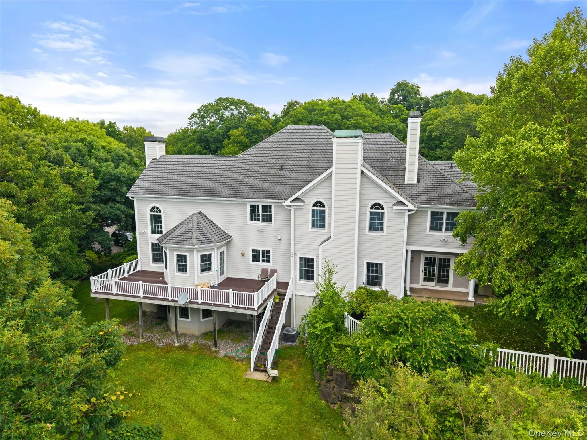 Rear View of 65 Indian Wells Road. offers a fence in area play area. perfect for field games. Rear View of 65 Indian Wells Road. offers a fence in area play area. perfect for field games.