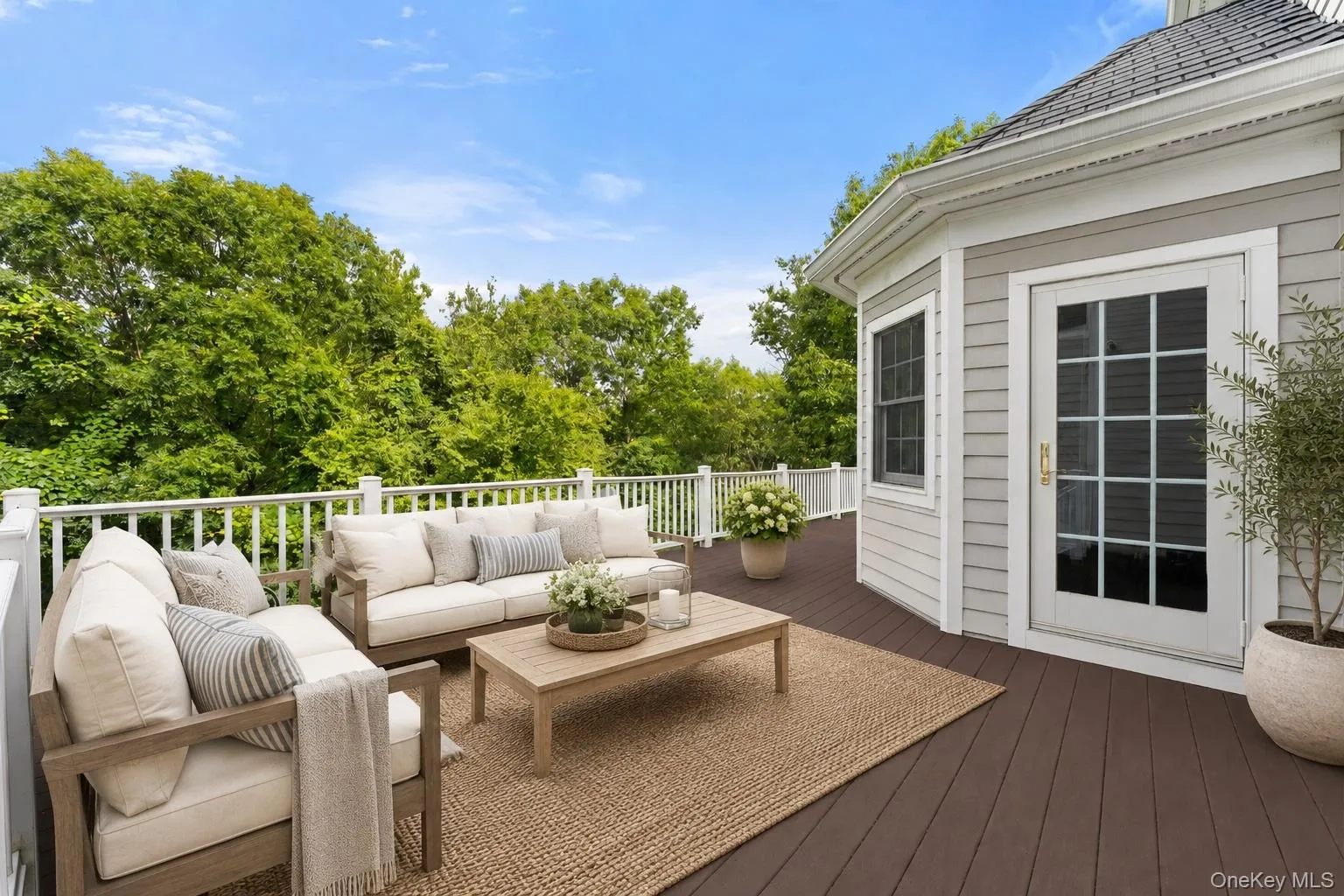 Virtually Staged deck on first floor directly off the Casual Dining Area, Family Room and Kitchen. Virtually Staged deck on first floor directly off the Casual Dining Area, Family Room and Kitchen.