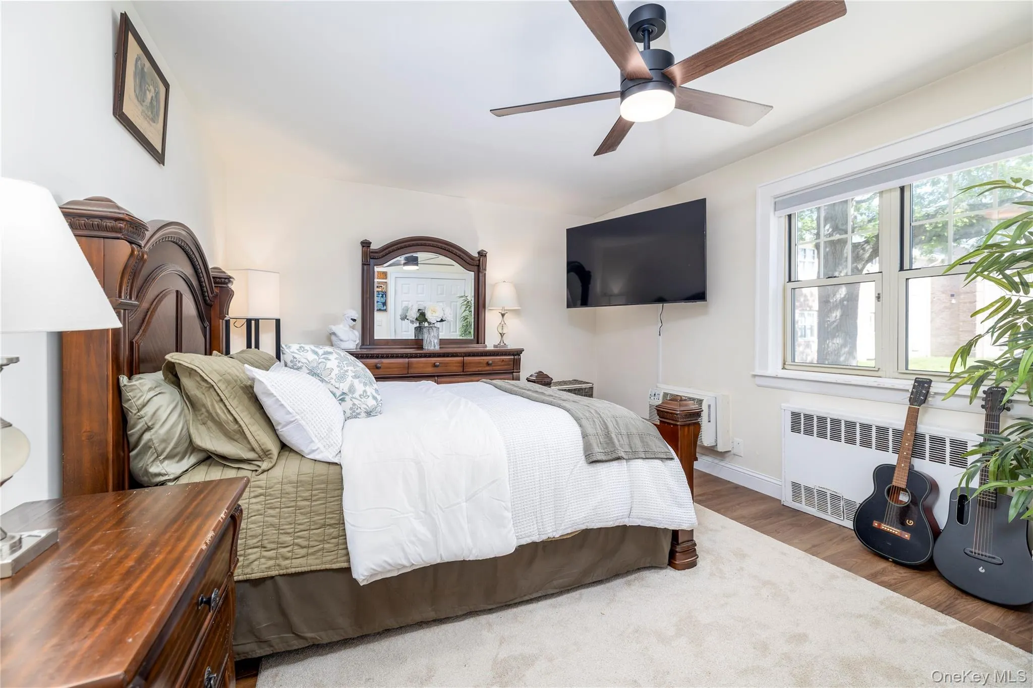 Sun-Filled Bedroom Offering Comfort & Style Sun-Filled Bedroom Offering Comfort & Style