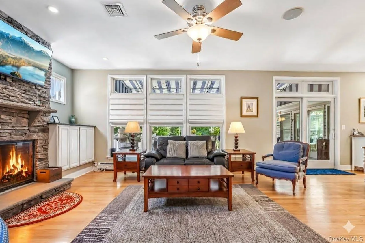 Living room with access to large deck. Living room with access to large deck.
