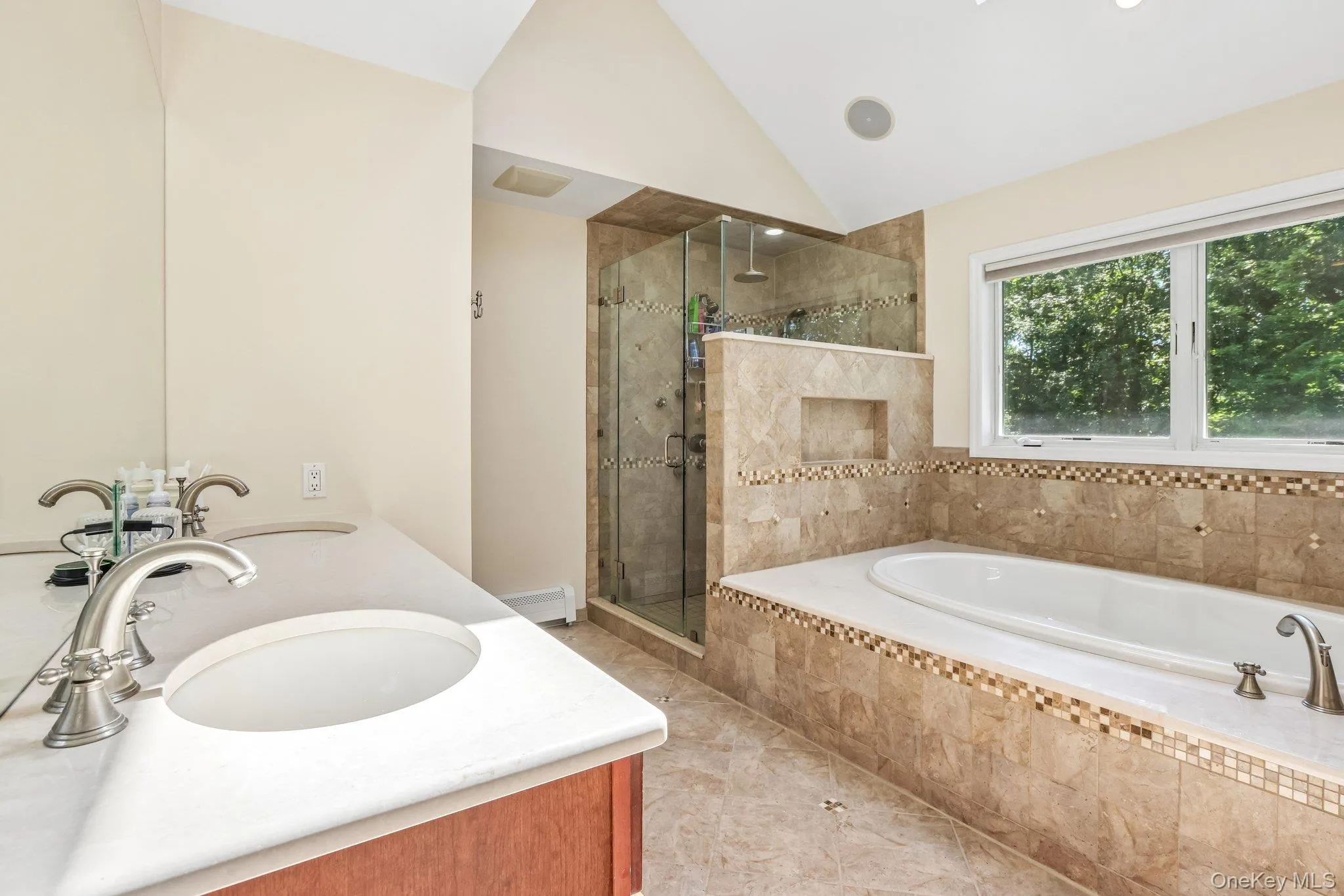 Dual sinks with marble countertop Dual sinks with marble countertop