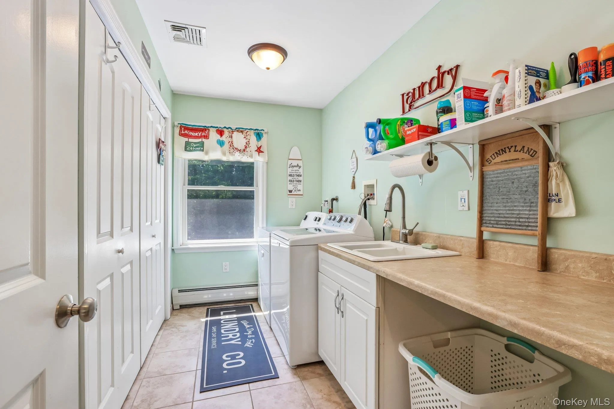 Second floor laundry room. Second floor laundry room.