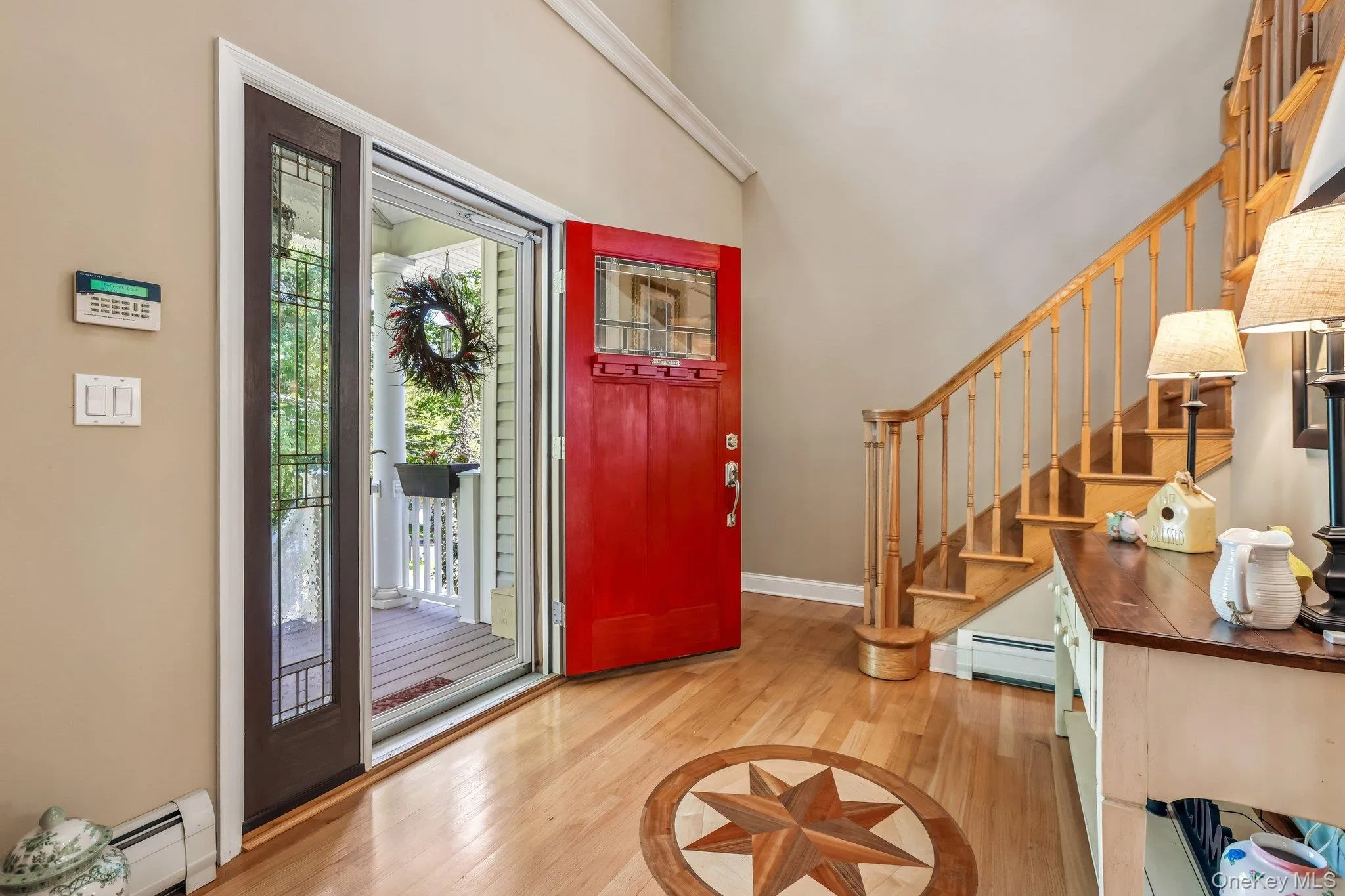 Two story foyer with inlay Two story foyer with inlay