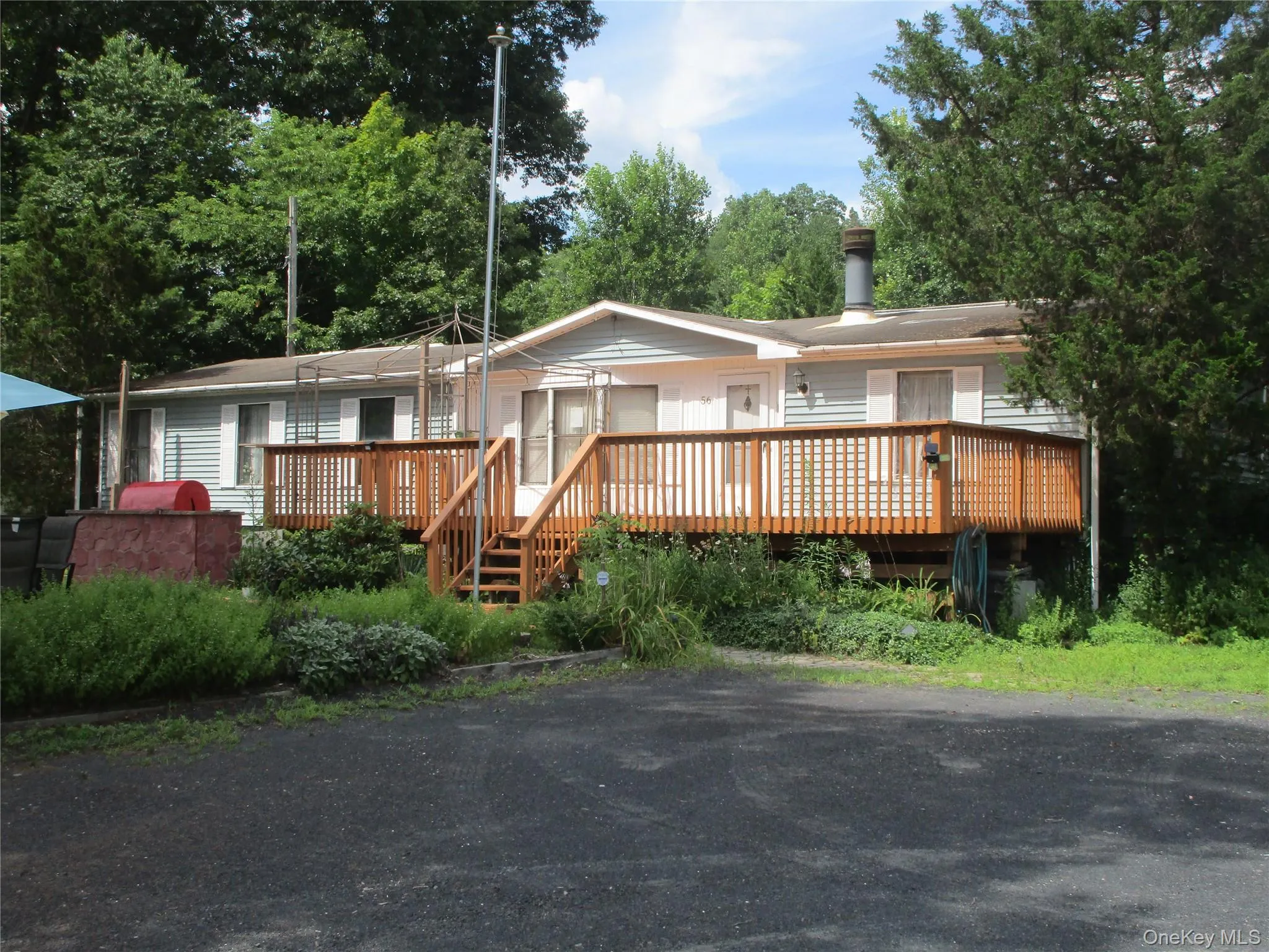 Home facing river and views will come from deck Home facing river and views will come from deck
