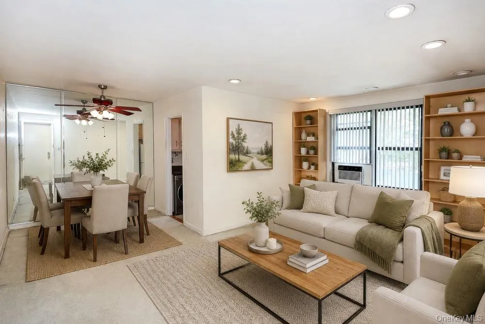 Staged Living Room/Dining Area Staged Living Room/Dining Area