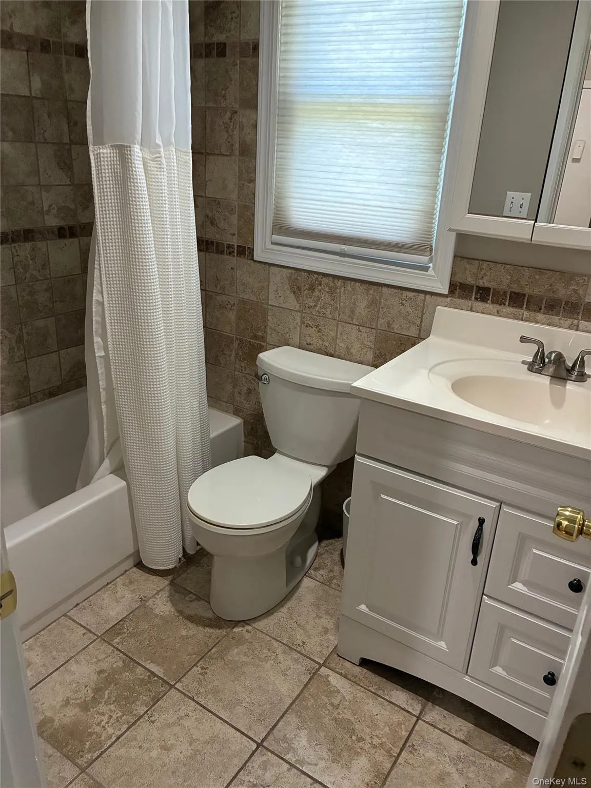 full bathroom with tub full bathroom with tub