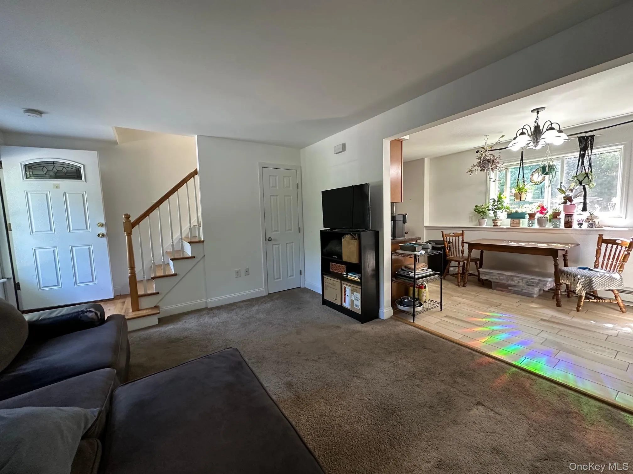 Living room with carpet floors Living room with carpet floors