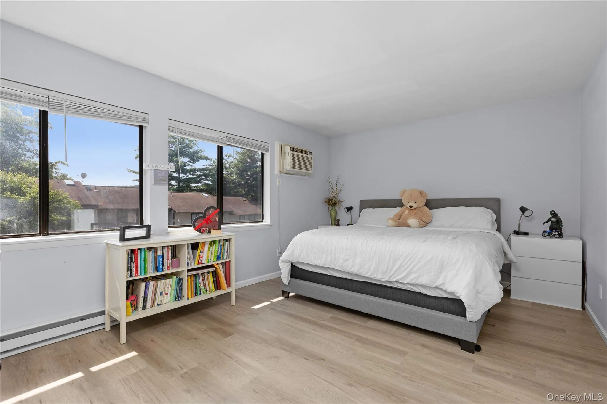 Primary bedroom featuring vinyl flooring accommodates a king or queen size bed set Primary bedroom featuring vinyl flooring accommodates a king or queen size bed set