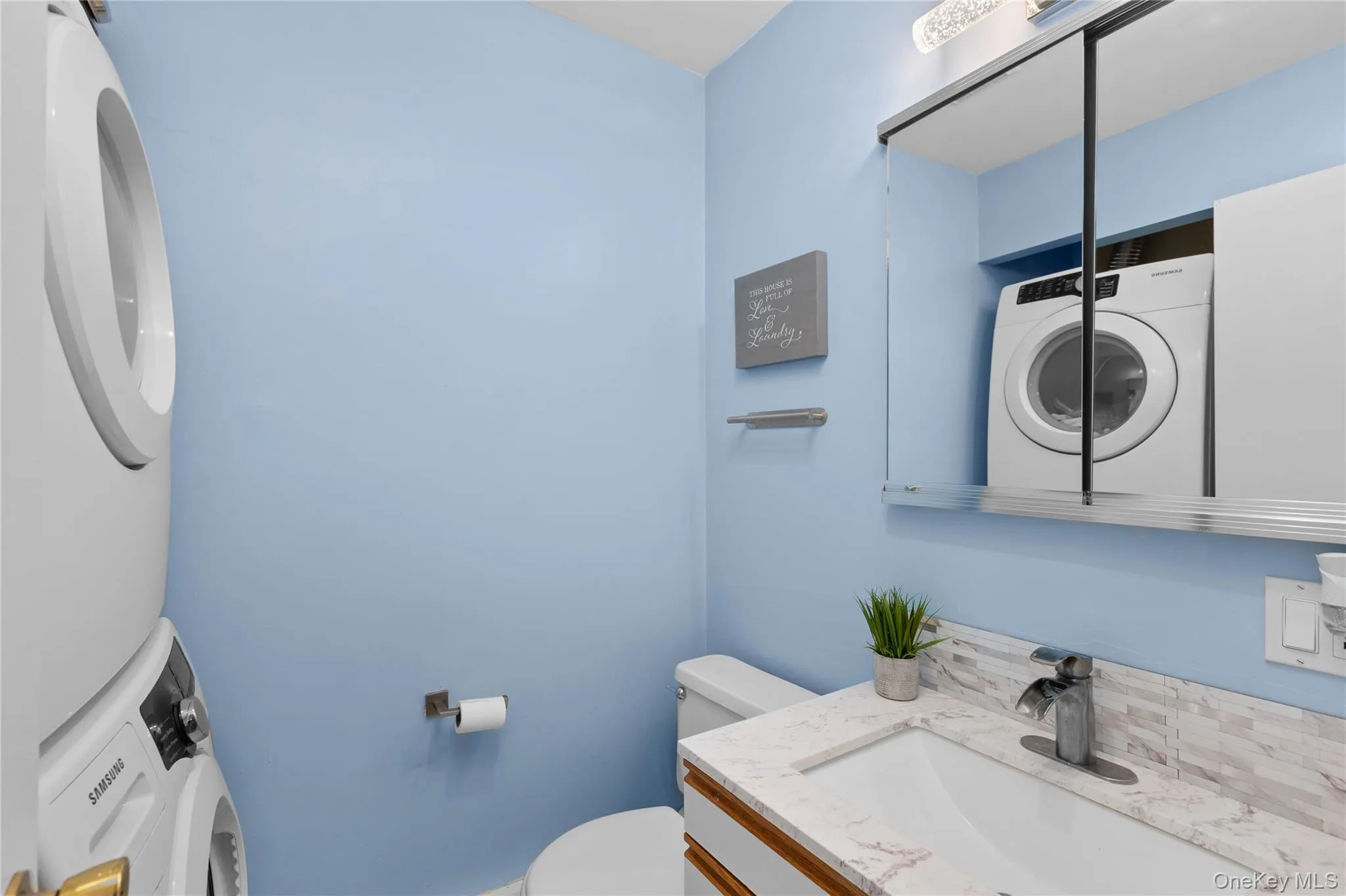 Guest restroom with washer and dryer Guest restroom with washer and dryer