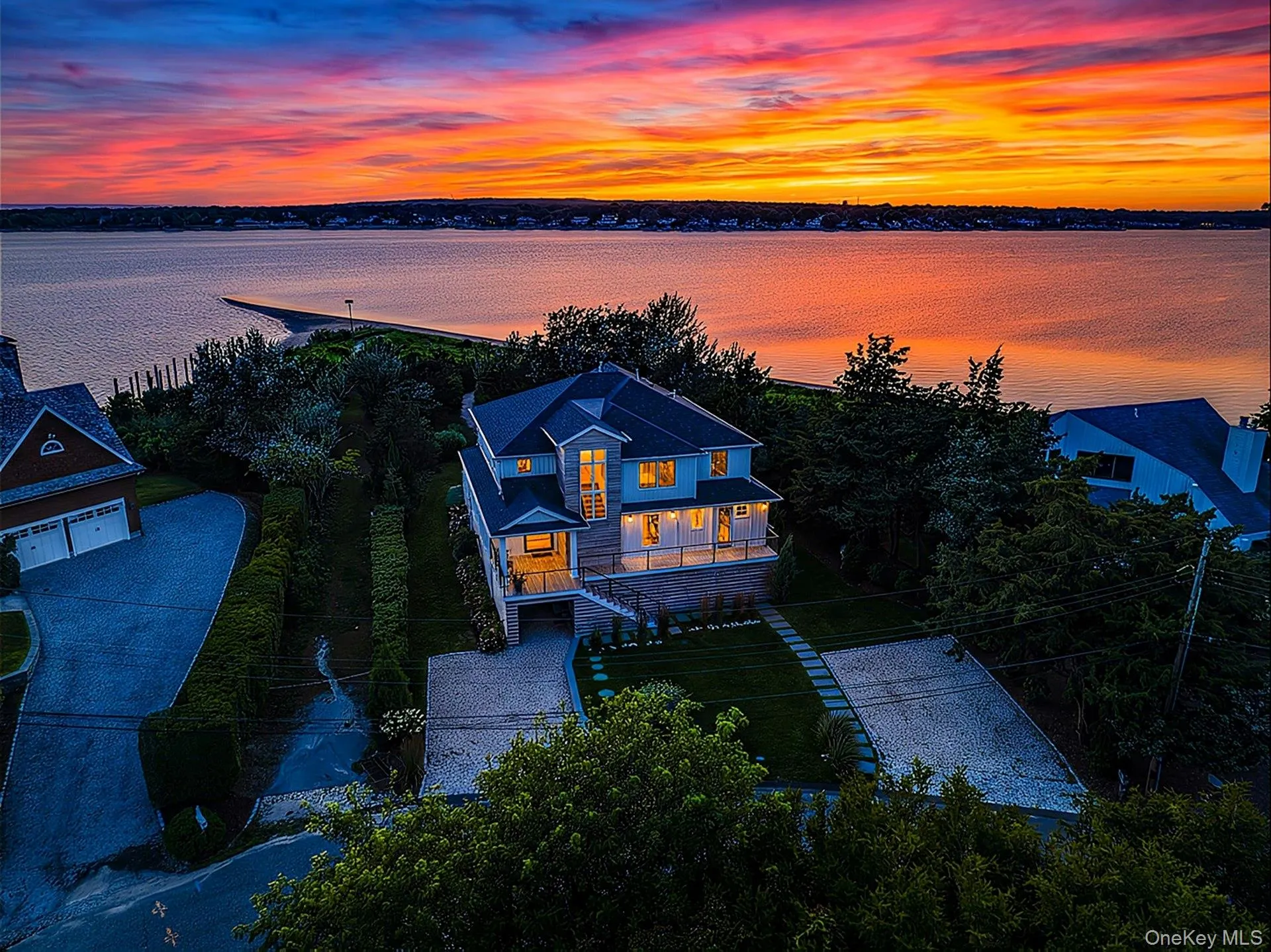 Waterfront property featuring a private beach and direct water access Waterfront property featuring a private beach and direct water access