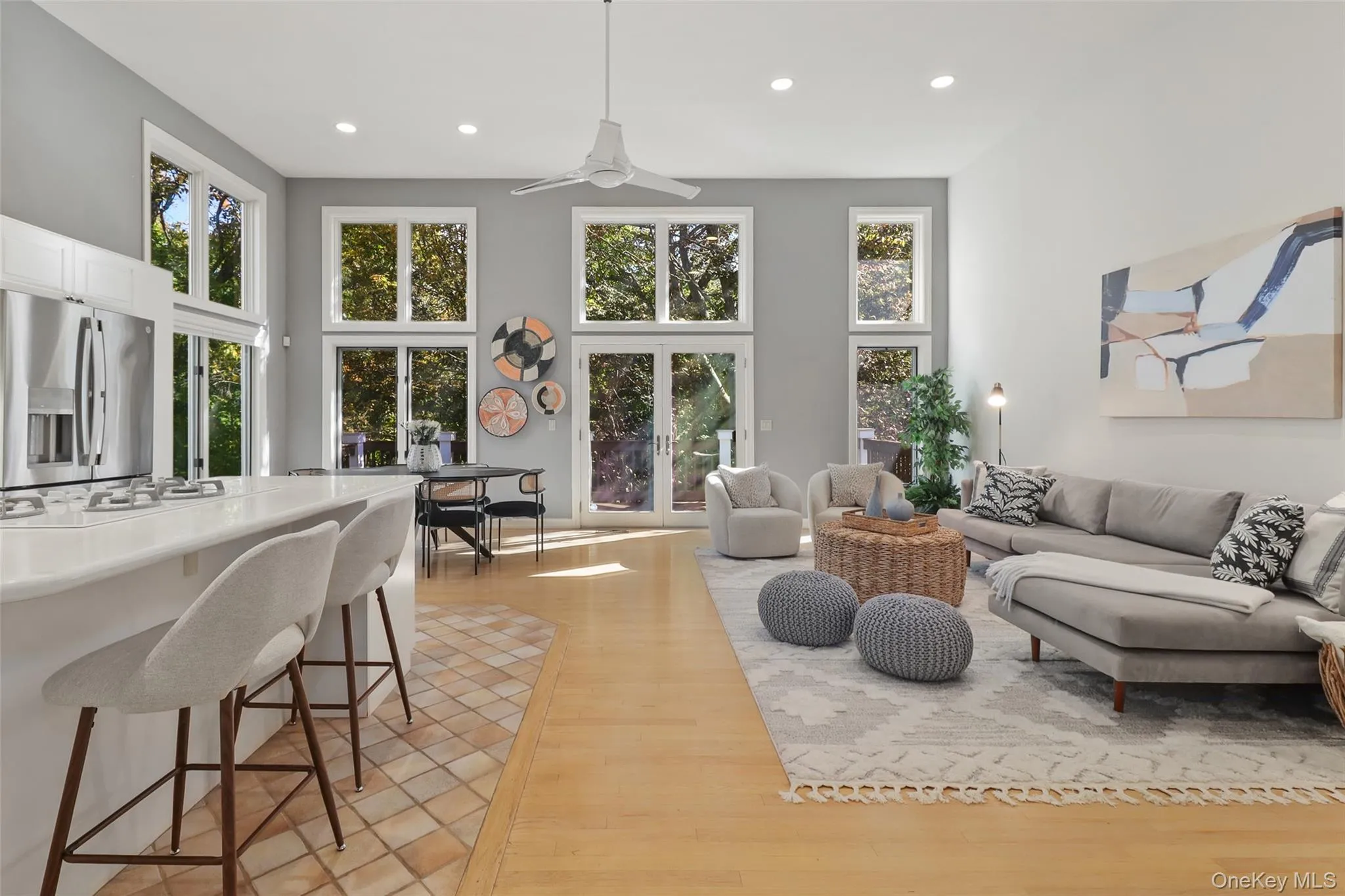 Kitchen, eat in kitchen, and family room with high ceilings and floor to ceiling windows Kitchen, eat in kitchen, and family room with high ceilings and floor to ceiling windows