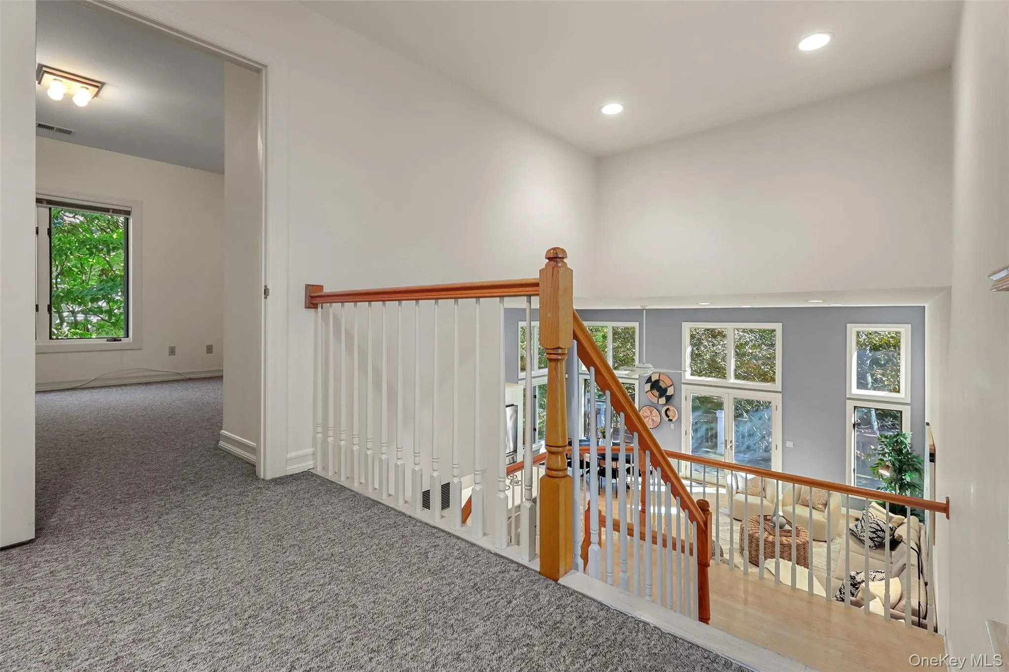 Visibility to the kitchen and family room from the second floor showing the high ceilings Visibility to the kitchen and family room from the second floor showing the high ceilings