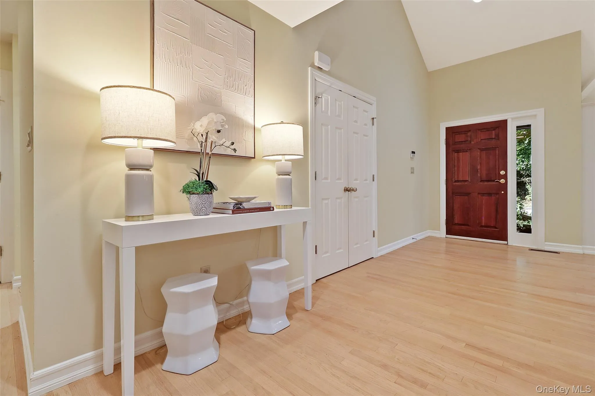 Front hall entryway and coat closet Front hall entryway and coat closet