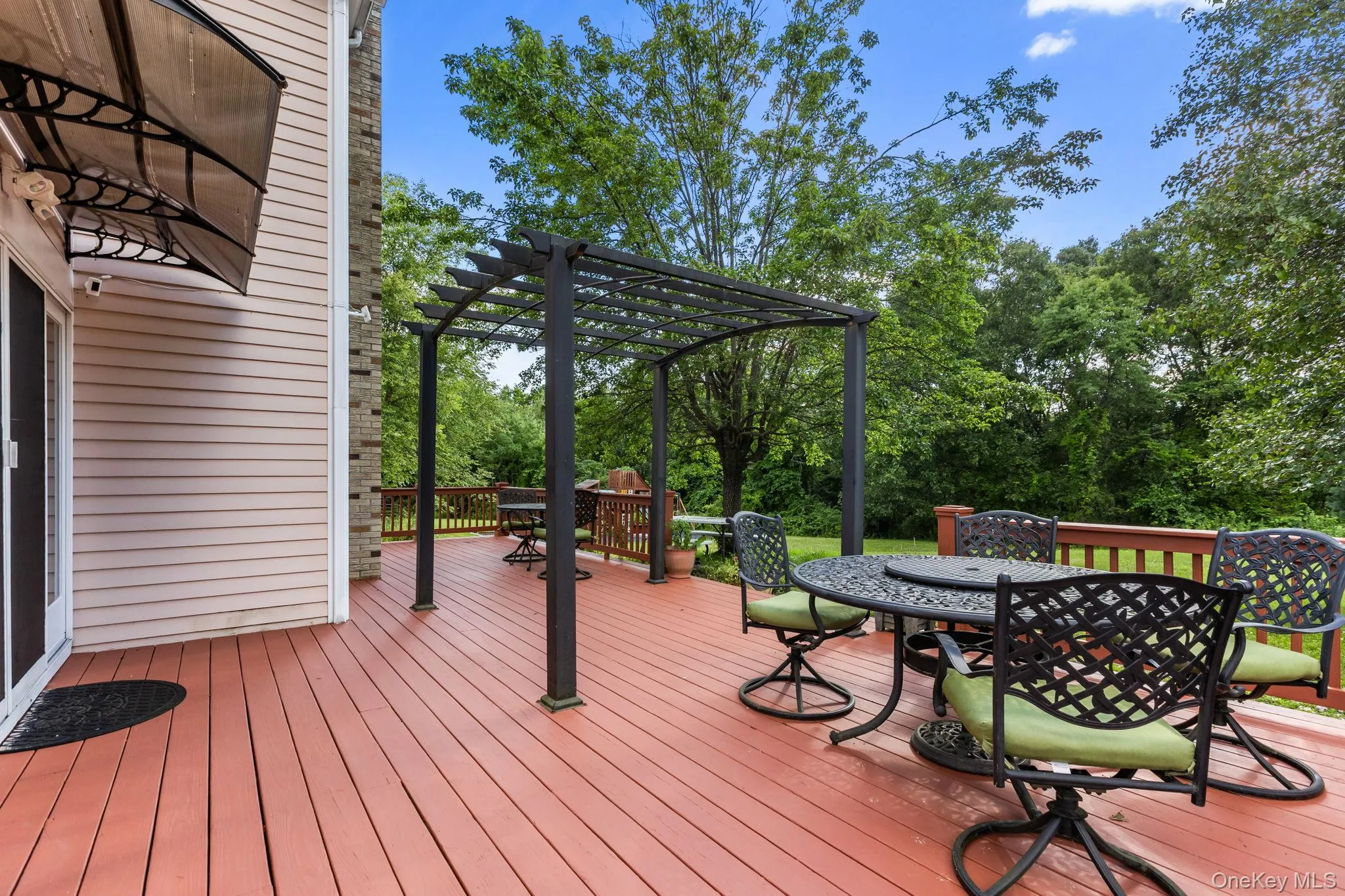 The newly painted deck and pergola provide an elegant extension of the home’s living space, ideal for alfresco entertaining. The newly painted deck and pergola provide an elegant extension of the home’s living space, ideal for alfresco entertaining.
