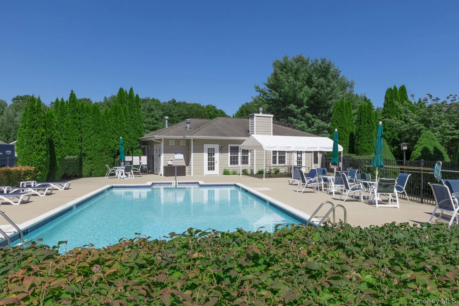 Outdoor swimming pool in rear of Clubhouse Outdoor swimming pool in rear of Clubhouse