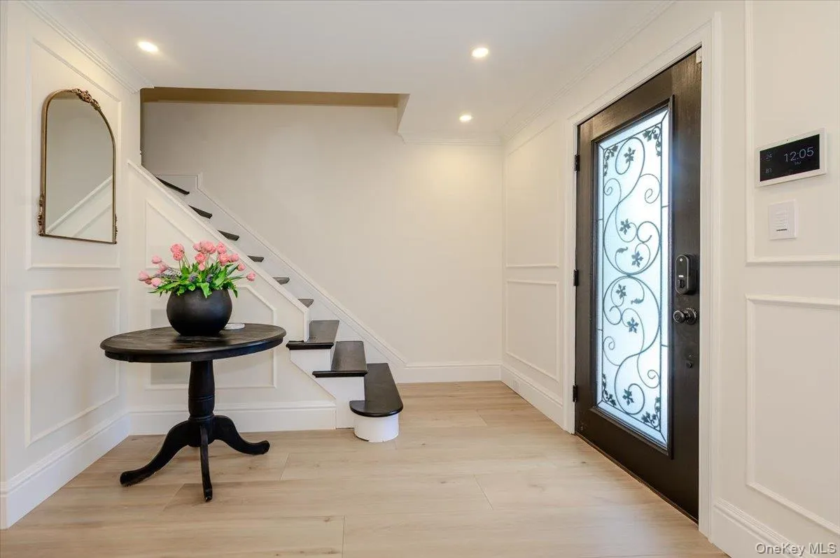 Spacious Entry Way with Porcelain Title Flooring throughout w/Radiant Heat Spacious Entry Way with Porcelain Title Flooring throughout w/Radiant Heat