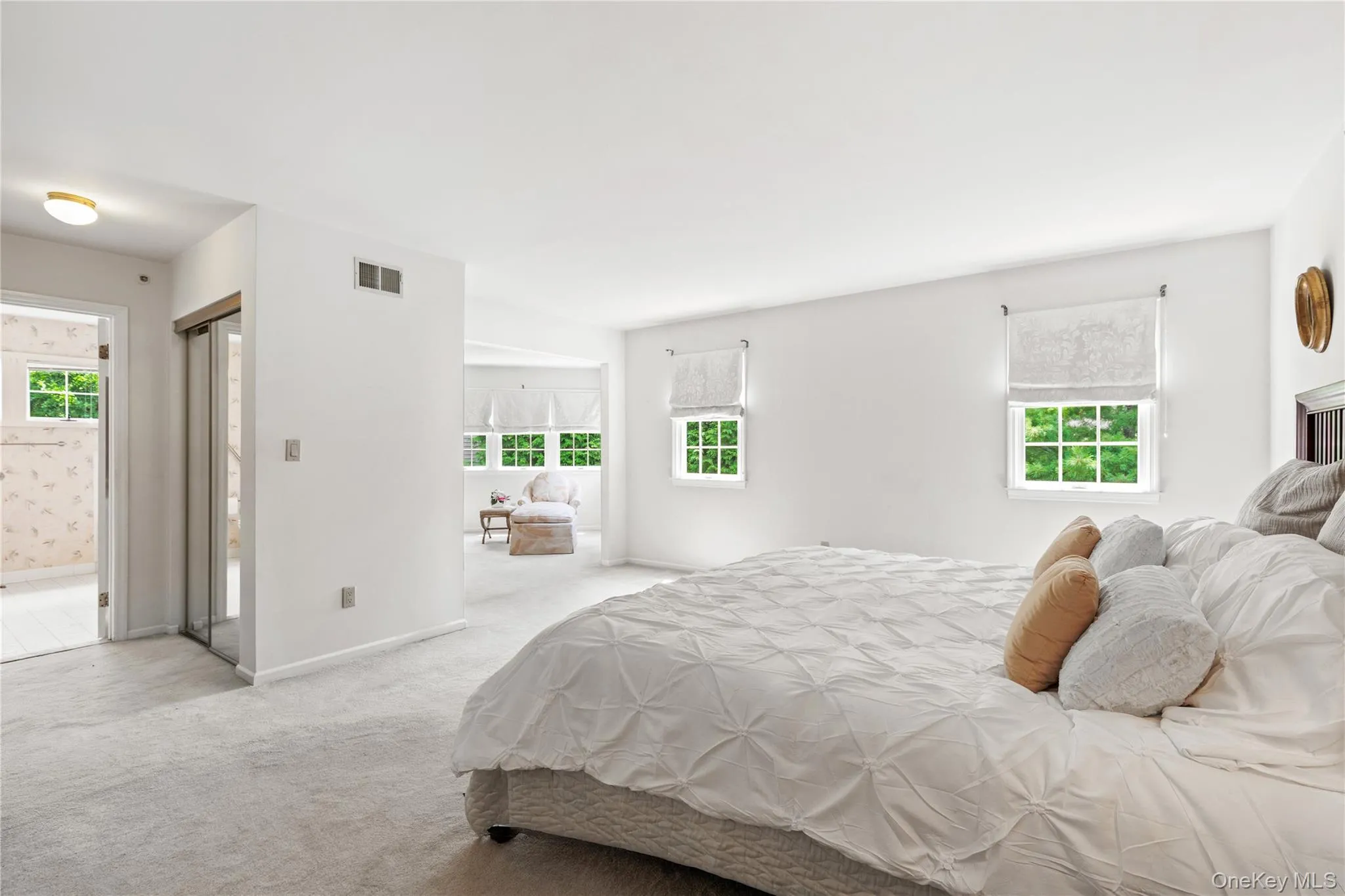 The Primary Suite features a bedroom, sitting room and bath The Primary Suite features a bedroom, sitting room and bath