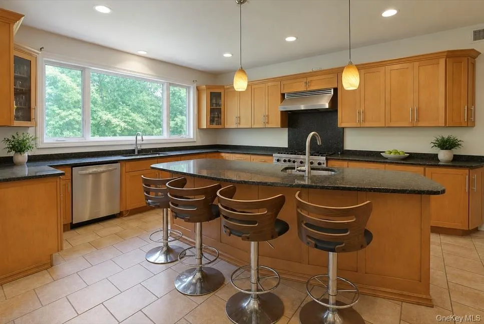 Kitchen with granite counter top. Kitchen with granite counter top.