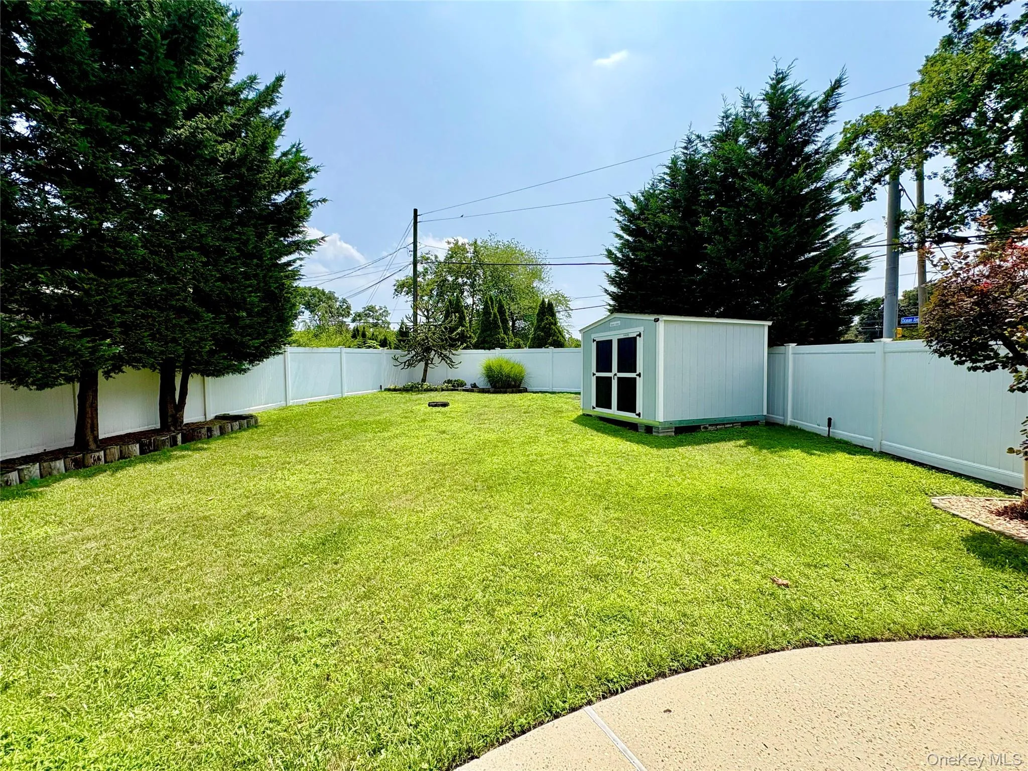 Large yard with Inground sprinklers. Large yard with Inground sprinklers.