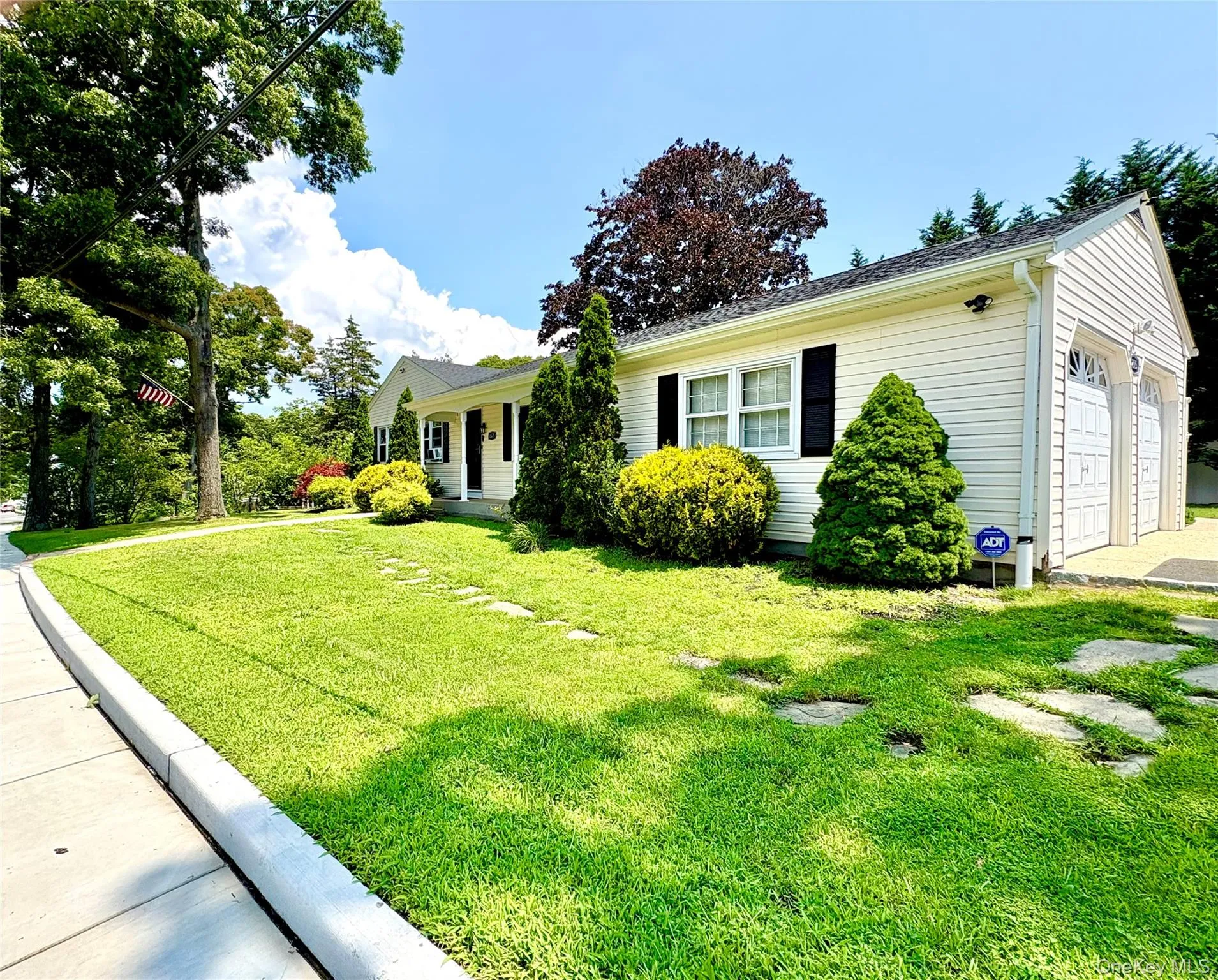 Front of home with sidewalks. Front of home with sidewalks.