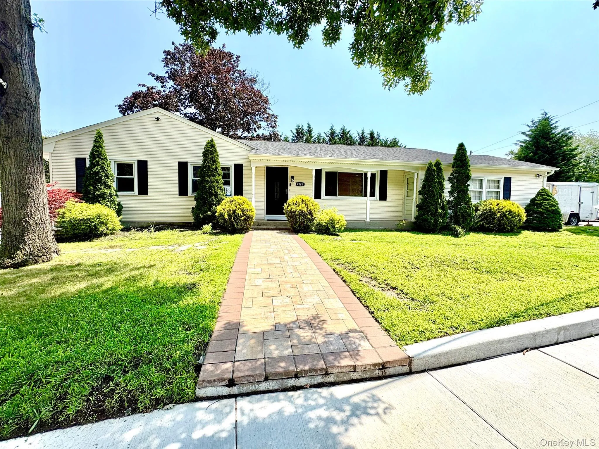 Front of home with sidewalks. Front of home with sidewalks.