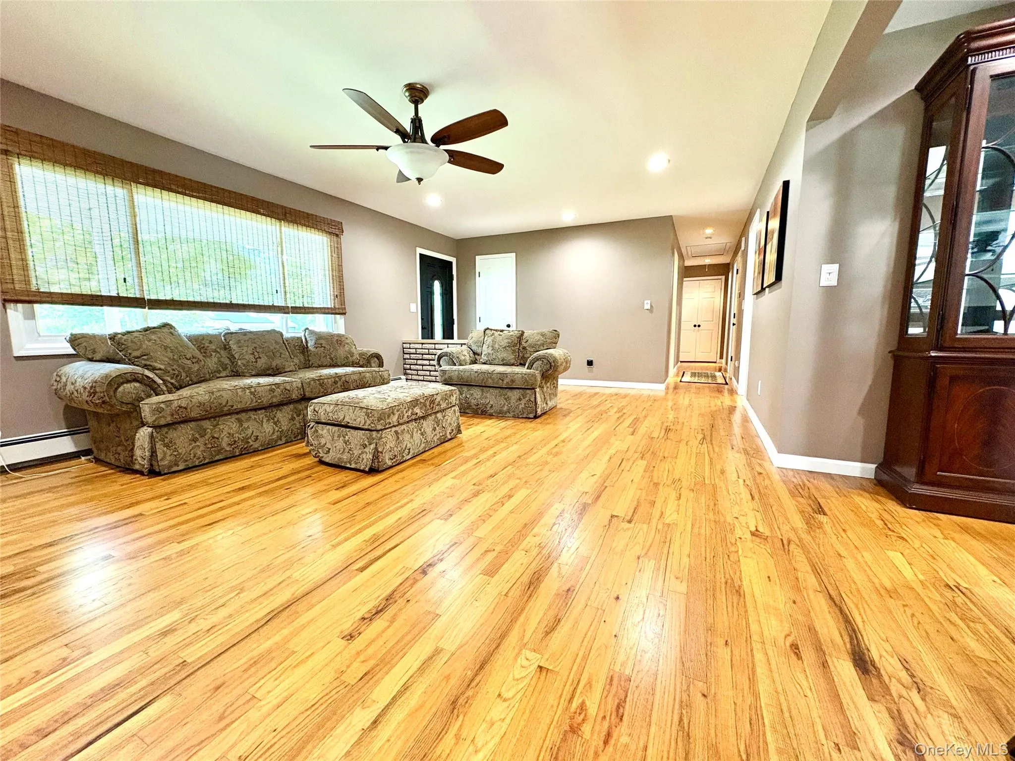 Large living room open to dining room. Large living room open to dining room.