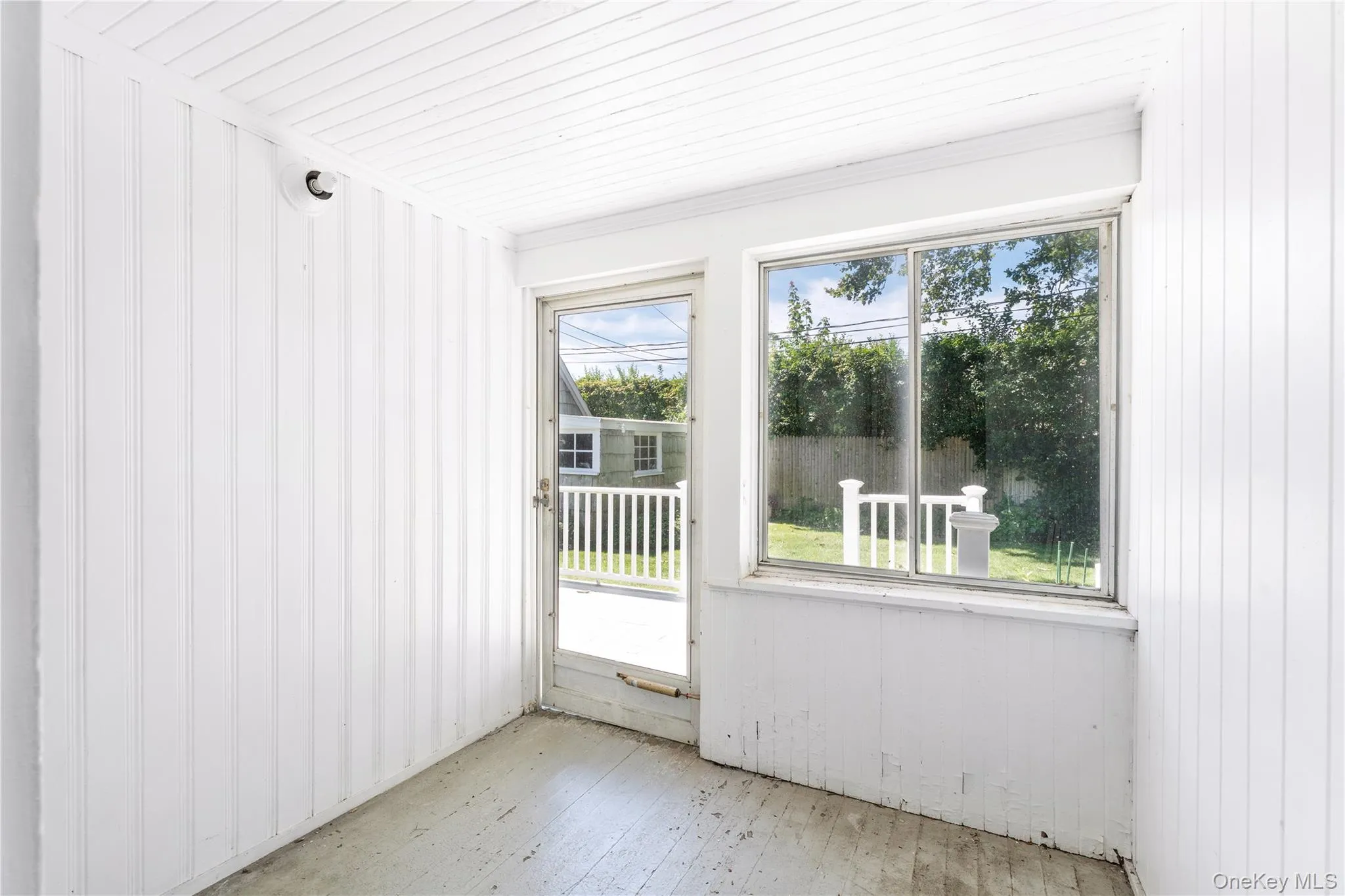 View of unfurnished sunroom View of unfurnished sunroom