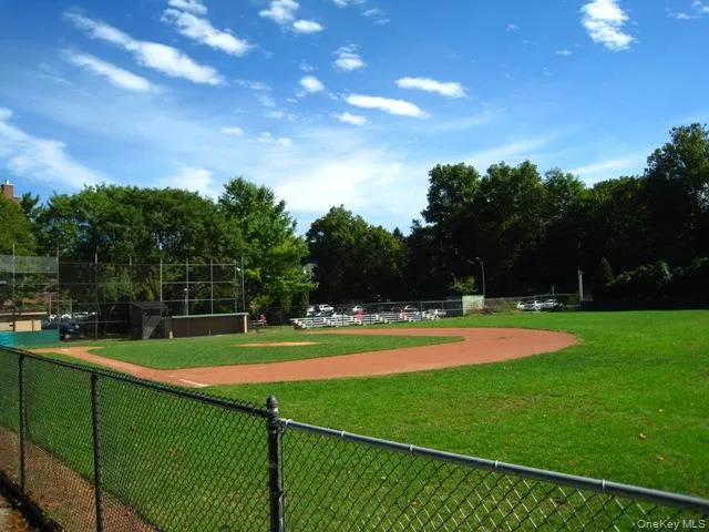 Garth Road Ball Field - Garth Road is a self contained tree lined street and 1/2 mile long starting at the Scarsdale Metro North Train Station and ending at the ball field. Easy walk to Scarsdale village and train. It's only a 33 minute train ride to Grand Central Terminal. As a resident you are entitled to join the Town’s Lake Isle Park, that features a Par 70, 18 hole golf course, 8 Tennis courts and 5 swimming pools including a 50 meter Olympic Pool with eight racing lanes. Garth Road Ball Field - Garth Road is a self contained tree lined street and 1/2 mile long starting at the Scarsdale Metro North Train Station and ending at the ball field. Easy walk to Scarsdale village and train. It's only a 33 minute train ride to Grand Central Terminal. As a resident you are entitled to join the Town’s Lake Isle Park, that features a Par 70, 18 hole golf course, 8 Tennis courts and 5 swimming pools including a 50 meter Olympic Pool with eight racing lanes.