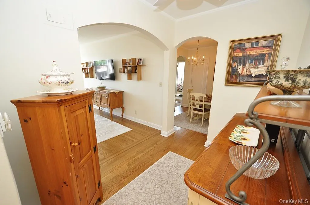 Entry Foyer opens to the sunny living room and works well as a home office Entry Foyer opens to the sunny living room and works well as a home office