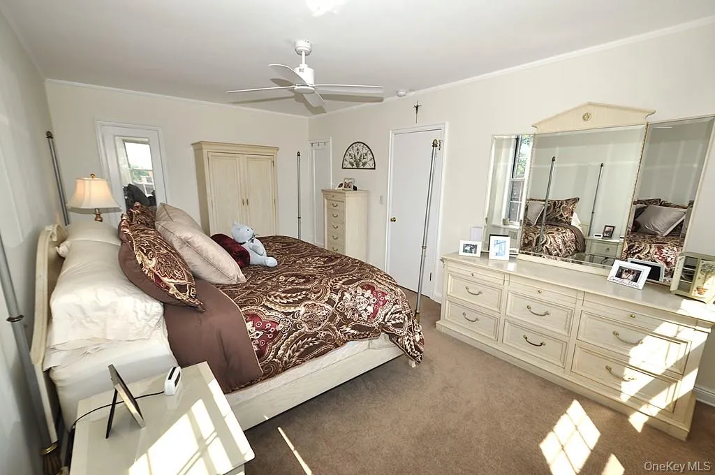 Large bedroom has covered hardwood floors, two closets and is approx 18'-1" x 10'-11" Large bedroom has covered hardwood floors, two closets and is approx 18'-1" x 10'-11"