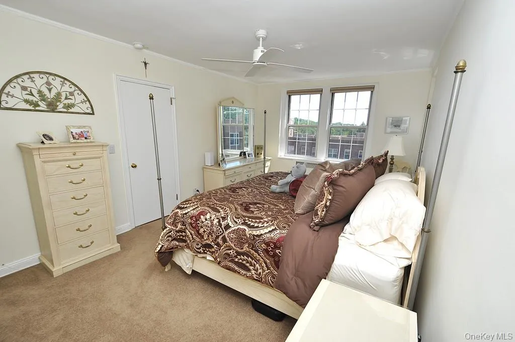 Large bedroom has covered hardwood floors, two closets and is approx 18'-1" x 10'-11" Large bedroom has covered hardwood floors, two closets and is approx 18'-1" x 10'-11"