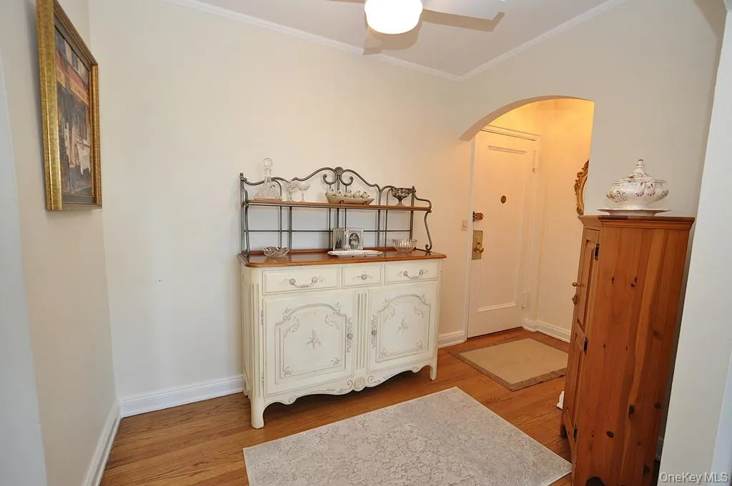 Entry Foyer opens to the sunny living room and works well as a home office Entry Foyer opens to the sunny living room and works well as a home office