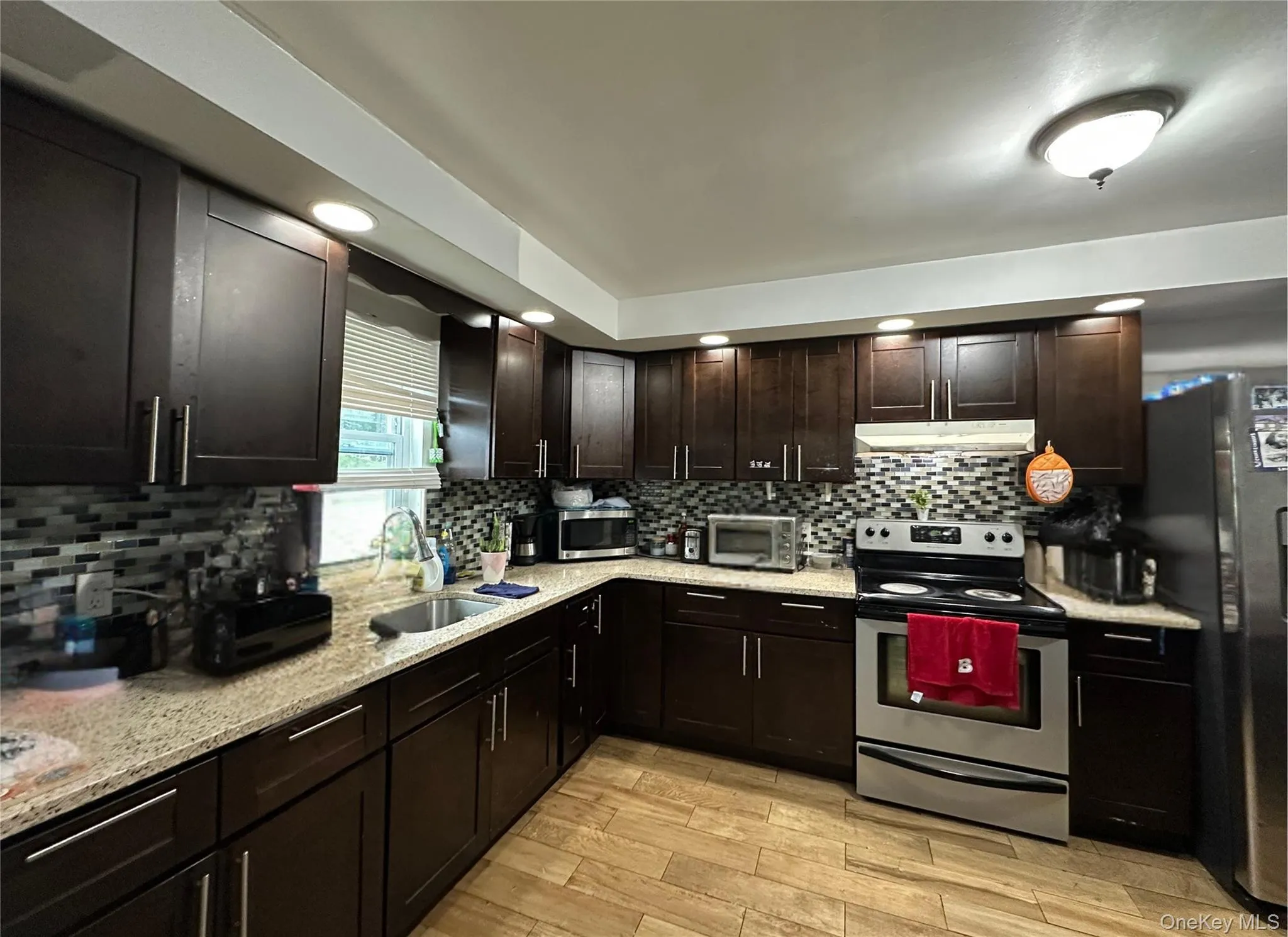 Eat in kitchen with stainless steel appliances Eat in kitchen with stainless steel appliances