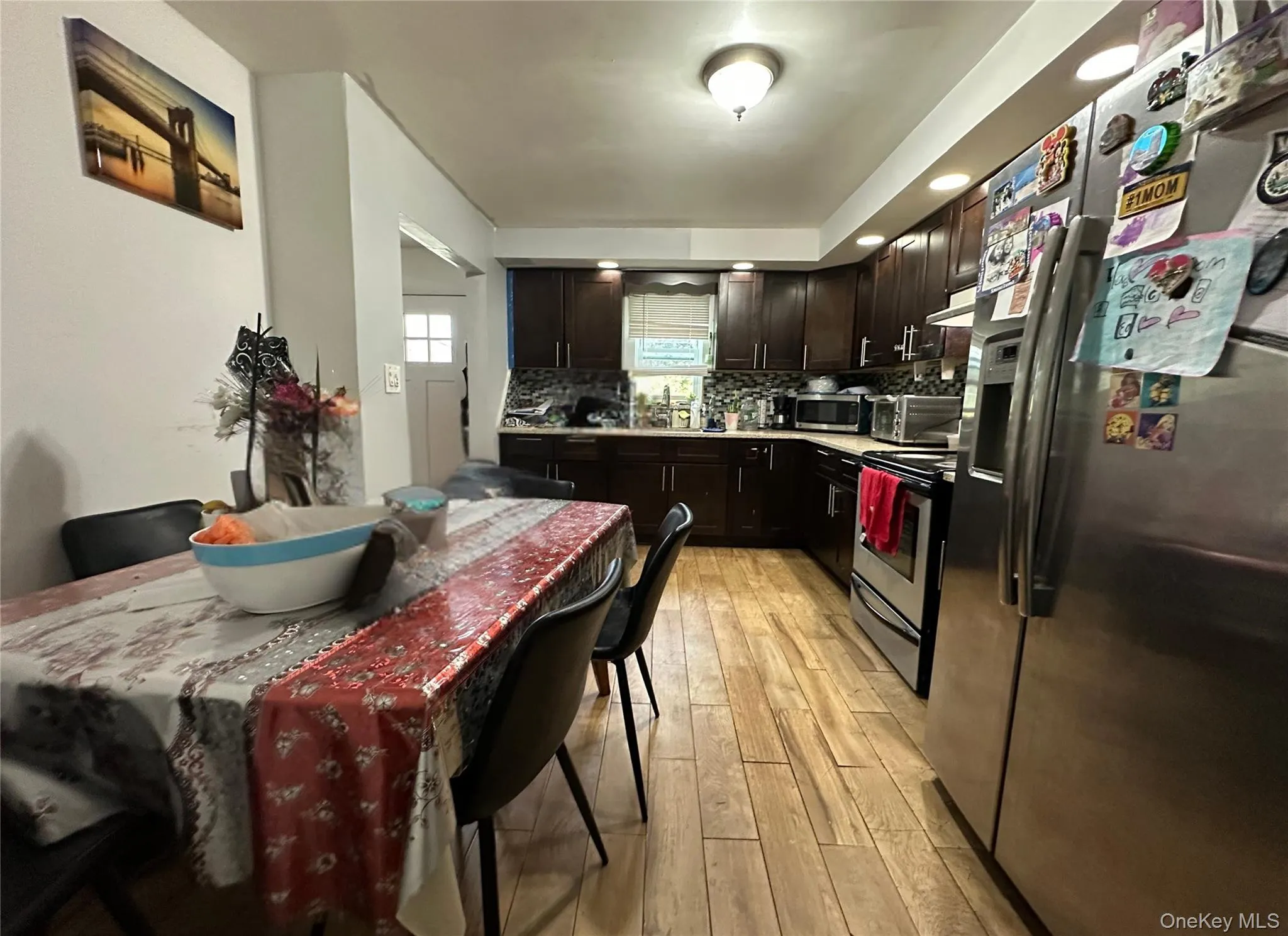 Eat in kitchen with stainless steel appliances Eat in kitchen with stainless steel appliances