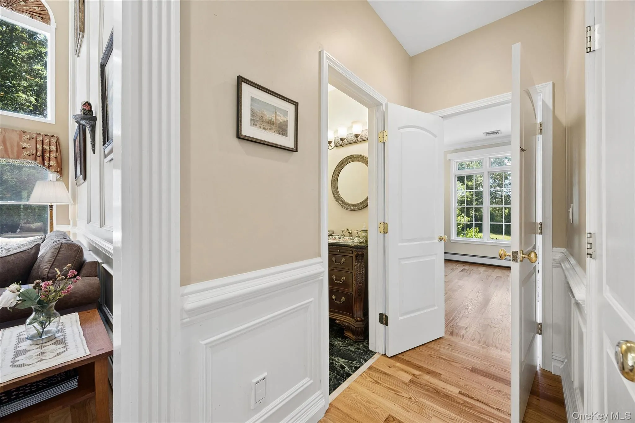 Hall to Powder Room & Primary Suite Hall to Powder Room & Primary Suite