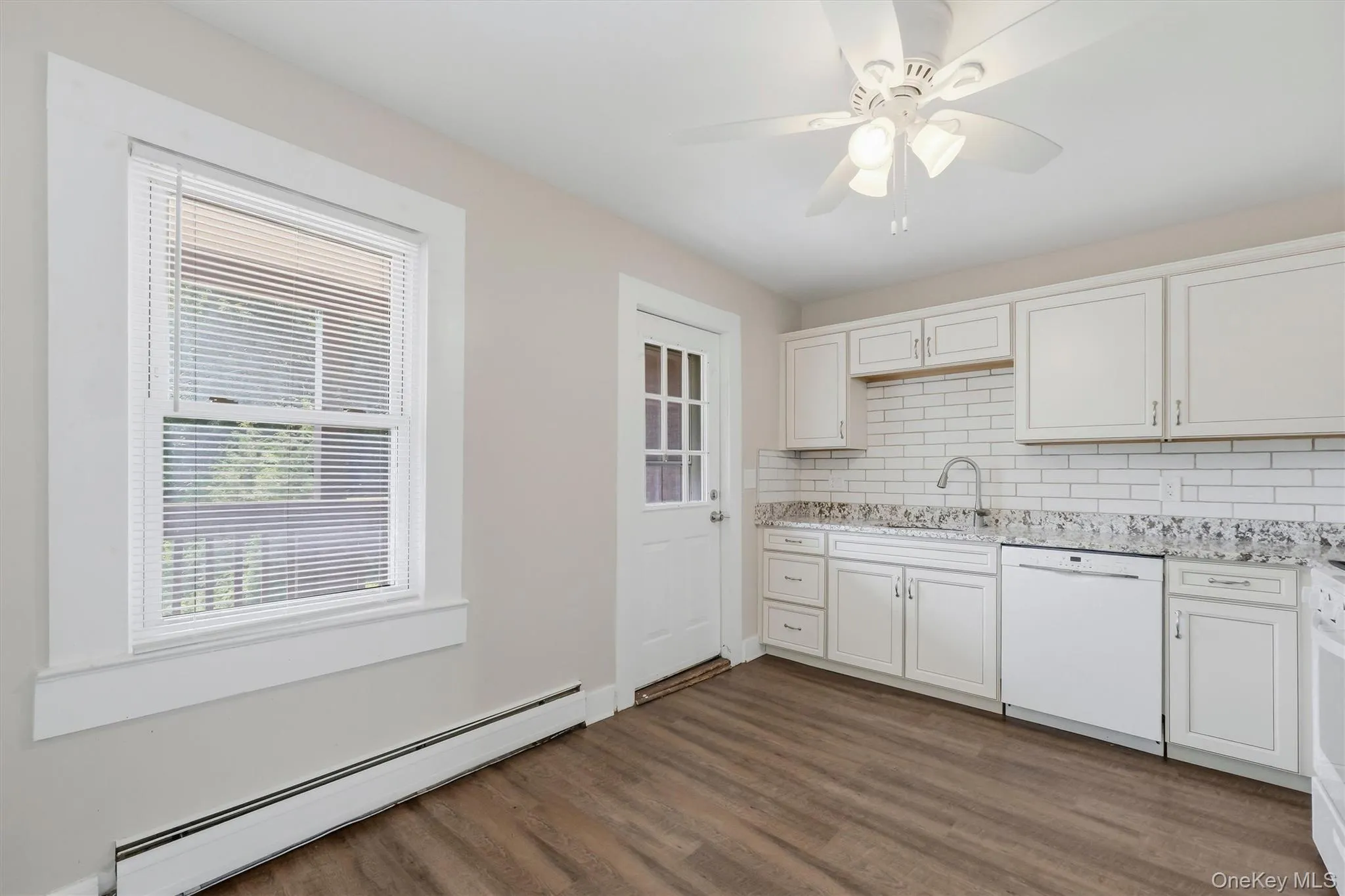 Access to private deck, via kitchen Access to private deck, via kitchen