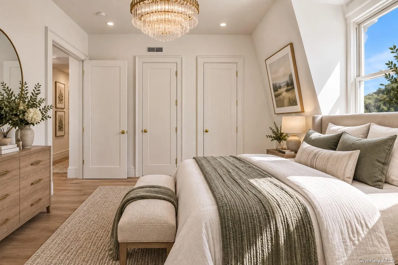 Virtually Staged Primary Bedroom — A bright and inviting bedroom showcasing the room’s generous proportions, natural light, hardwood floors, and ample closet space, creating a comfortable and relaxing retreat. Virtually Staged Primary Bedroom — A bright and inviting bedroom showcasing the room’s generous proportions, natural light, hardwood floors, and ample closet space, creating a comfortable and relaxing retreat.