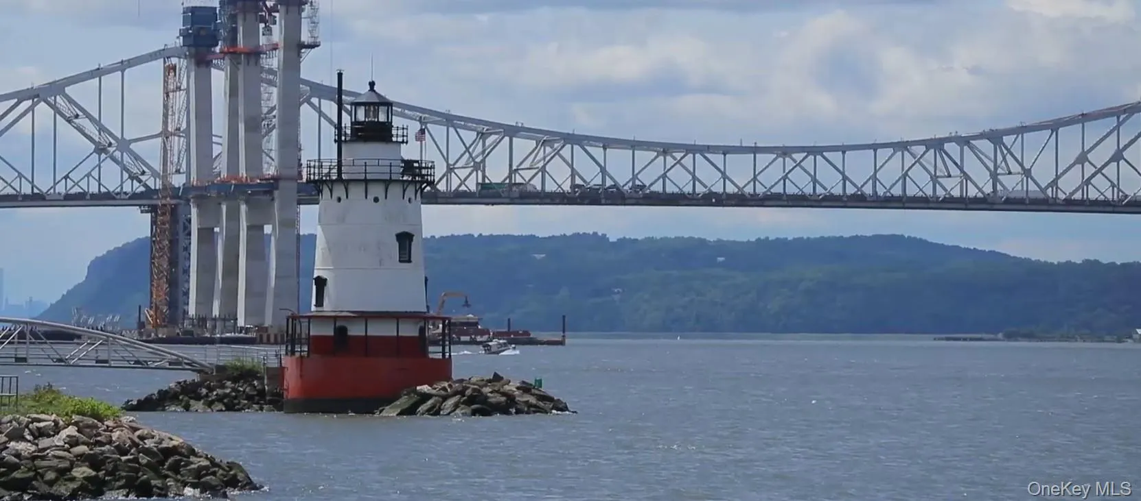 Iconic Tarrytown Waterfront Views — A picturesque Hudson River scene featuring the historic Tarrytown Lighthouse with the Governor Mario M. Cuomo Bridge in the background, showcasing the beauty and character of Tarrytown’s waterfront. Iconic Tarrytown Waterfront Views — A picturesque Hudson River scene featuring the historic Tarrytown Lighthouse with the Governor Mario M. Cuomo Bridge in the background, showcasing the beauty and character of Tarrytown’s waterfront.