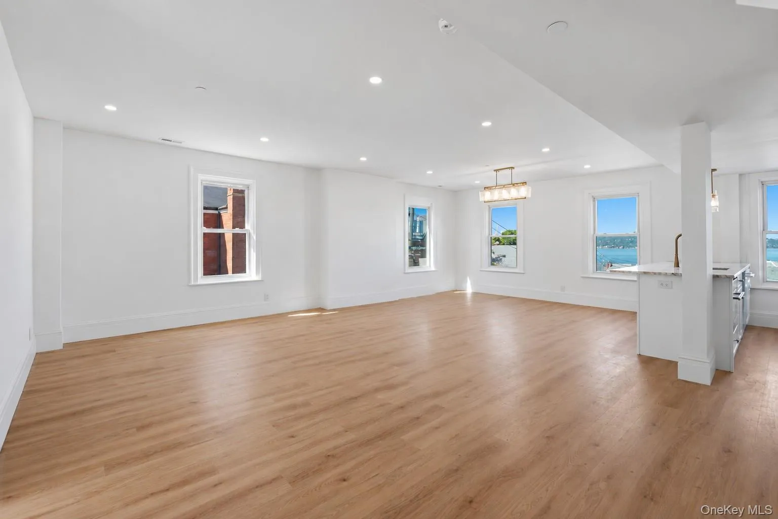 Unit1: Living Room with Stunning Hudson River and Mario Cuomo Bridge Views Unit1: Living Room with Stunning Hudson River and Mario Cuomo Bridge Views