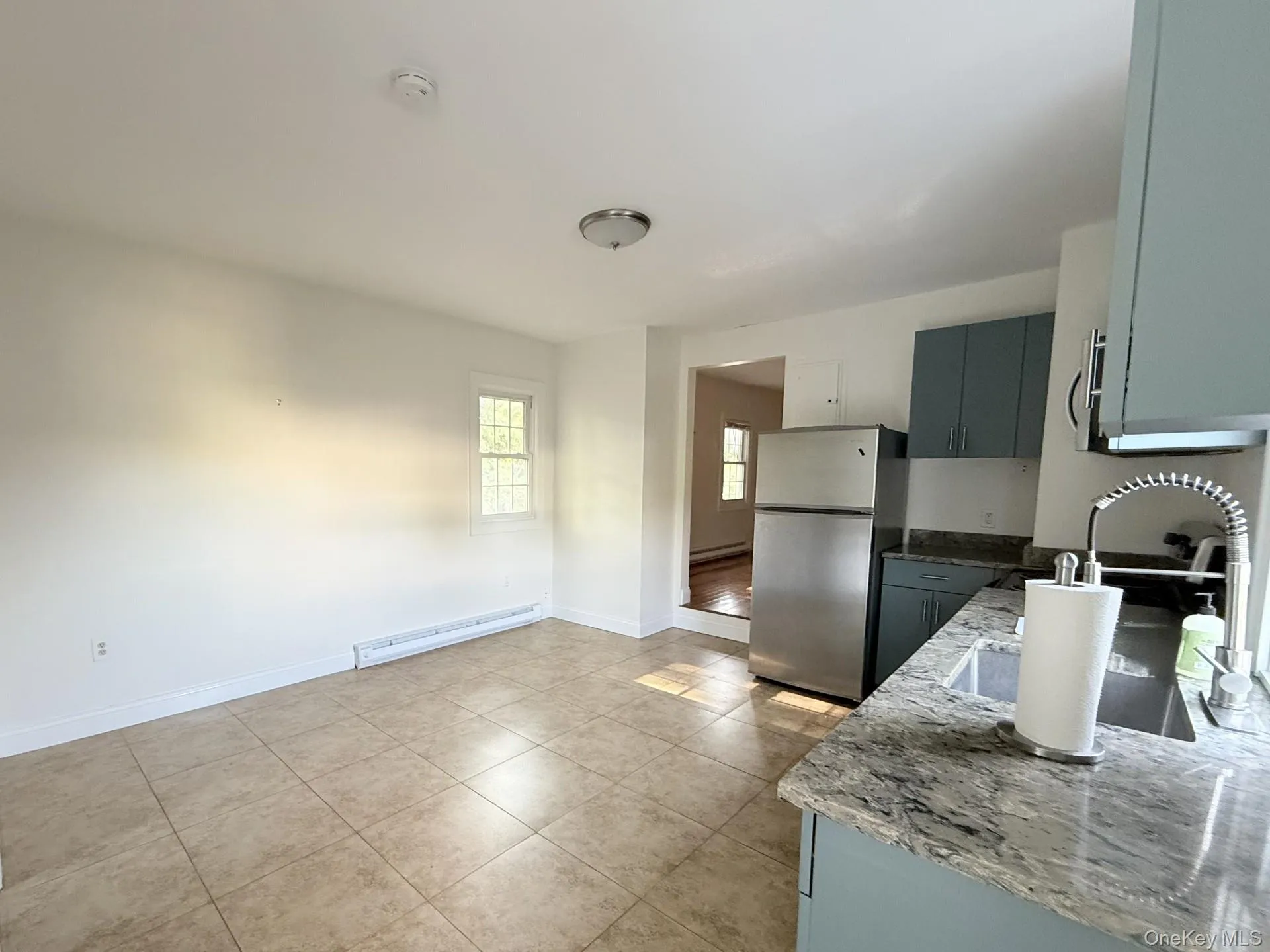 Updated kitchen and open dining area Updated kitchen and open dining area