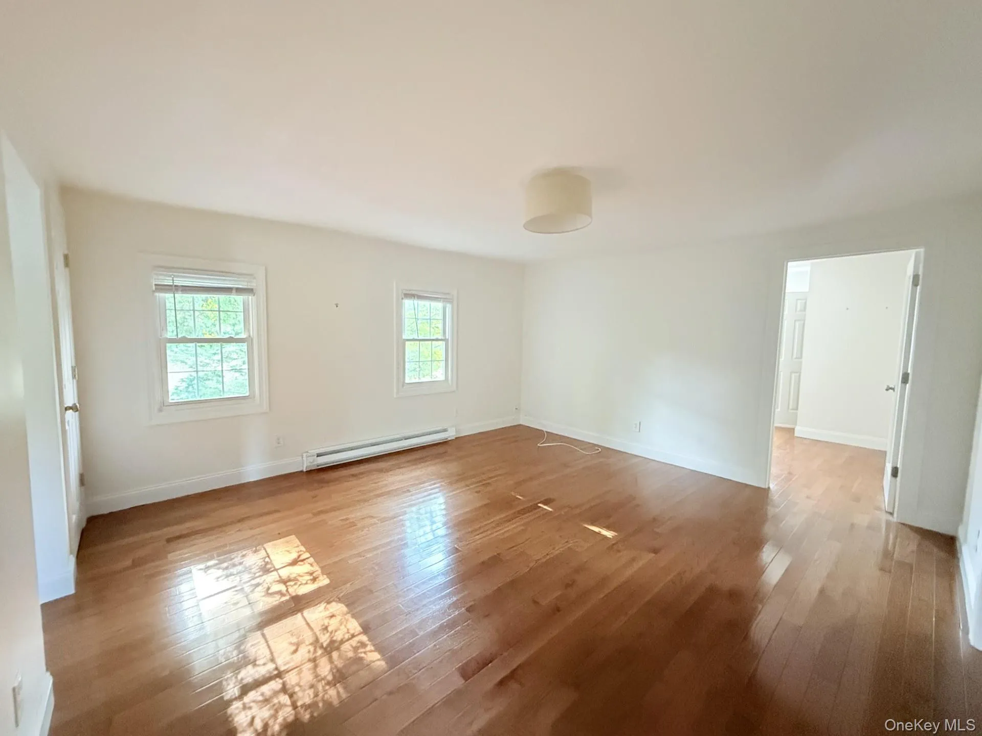 Living Room, gleaming hardwood floors throughout Living Room, gleaming hardwood floors throughout