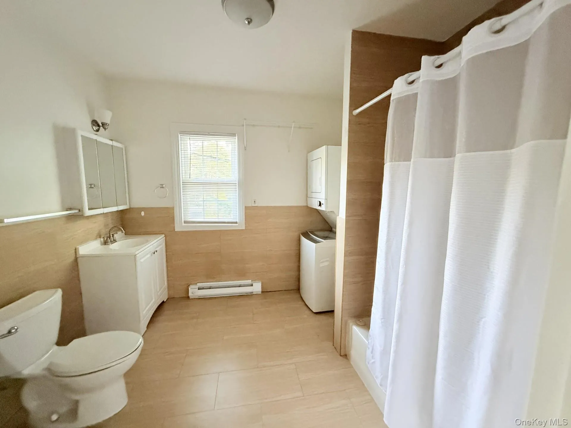 Large full bathroom with washer and dryer Large full bathroom with washer and dryer