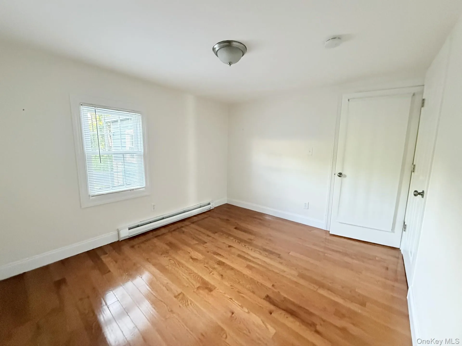 1st Bedroom w/closet, hardwood floors 1st Bedroom w/closet, hardwood floors