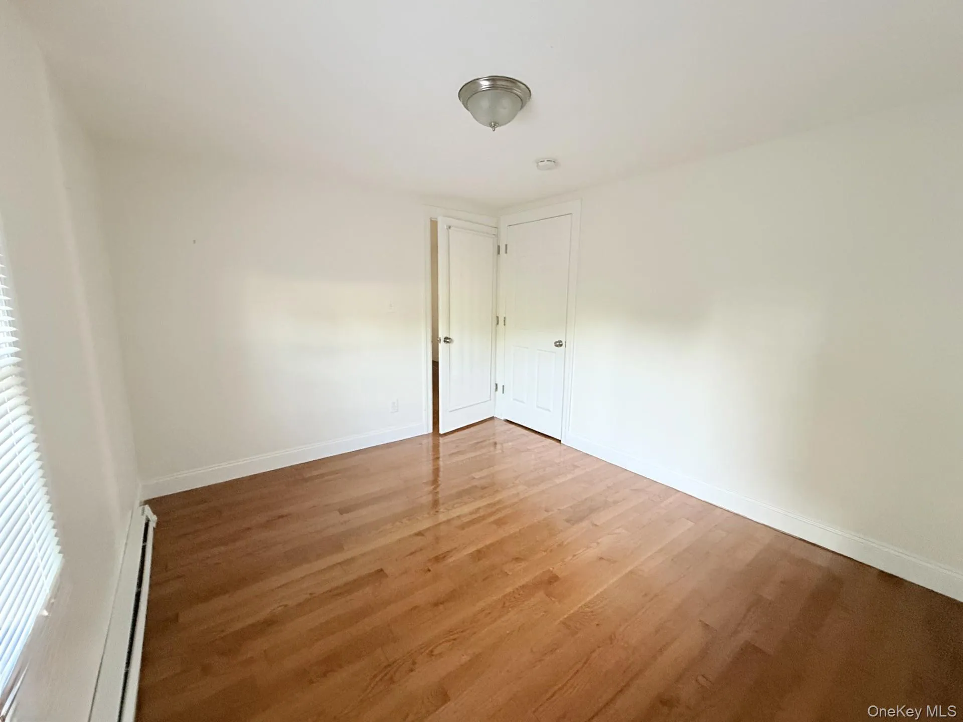 1st Bedroom w/closet, hardwood floors 1st Bedroom w/closet, hardwood floors