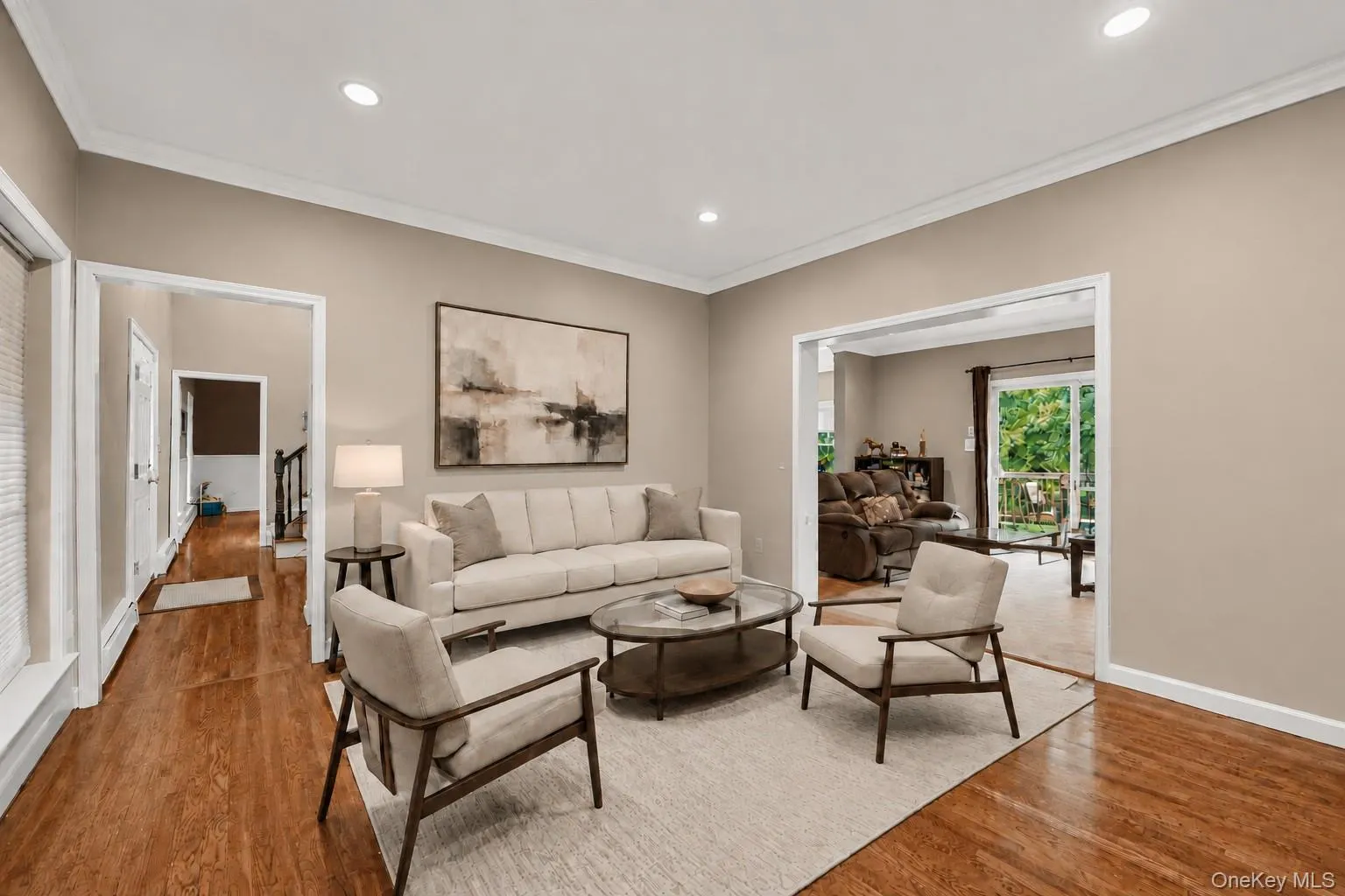 Virtually staged formal living room. Virtually staged formal living room.