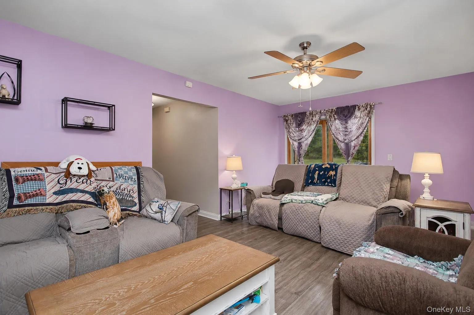 Big, bright living room with ceiling fan Big, bright living room with ceiling fan
